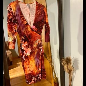 Cache size small colorful V neck dress with faux wrapped rushed lower bodice.